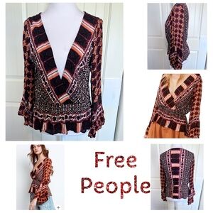 Free People Rosalie Bell Sleeve Faux
Wrap Top Sz Medium